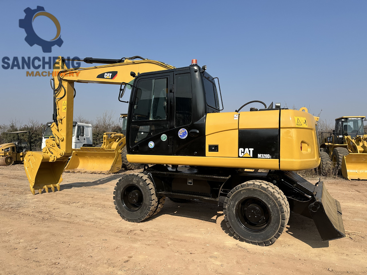 CATERPILLAR M320D2 - Máy xúc bánh lốp: hình 1 CATERPILLAR M320D2 - Máy xúc bánh lốp: hình 1