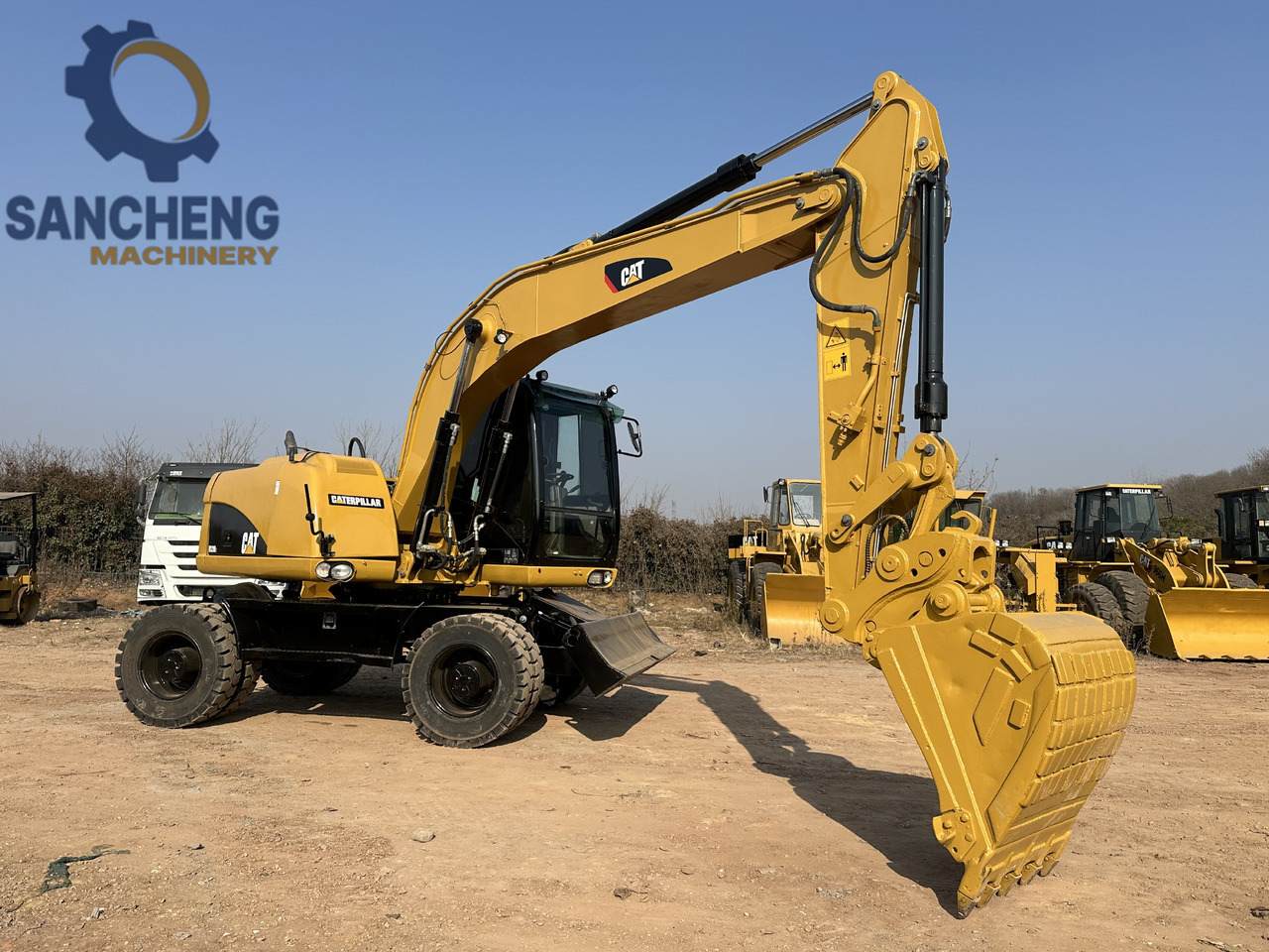 CATERPILLAR M320D2 wheel excavator - Máy xúc bánh lốp: hình 1 CATERPILLAR M320D2 wheel excavator - Máy xúc bánh lốp: hình 1