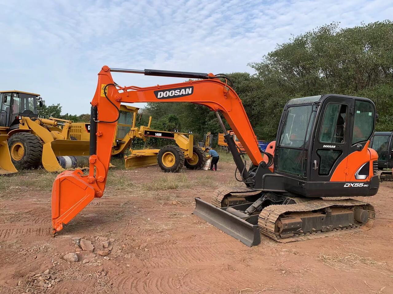 DOOSAN DX55 - Máy xúc: hình 1 DOOSAN DX55 - Máy xúc: hình 1