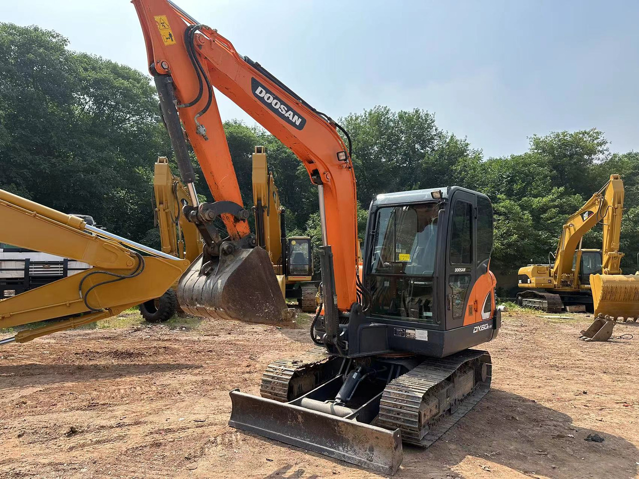 DOOSAN DX60 - Máy xúc mini: hình 3 DOOSAN DX60 - Máy xúc mini: hình 3