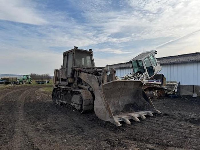 Caterpillar - Máy xúc: hình 1 Caterpillar - Máy xúc: hình 1