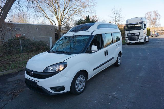 Fiat Doblo 1.6 16V Multijet 88kW Rollstuhlumbau - Xe van chở khách: hình 1 Fiat Doblo 1.6 16V Multijet 88kW Rollstuhlumbau - Xe van chở khách: hình 1