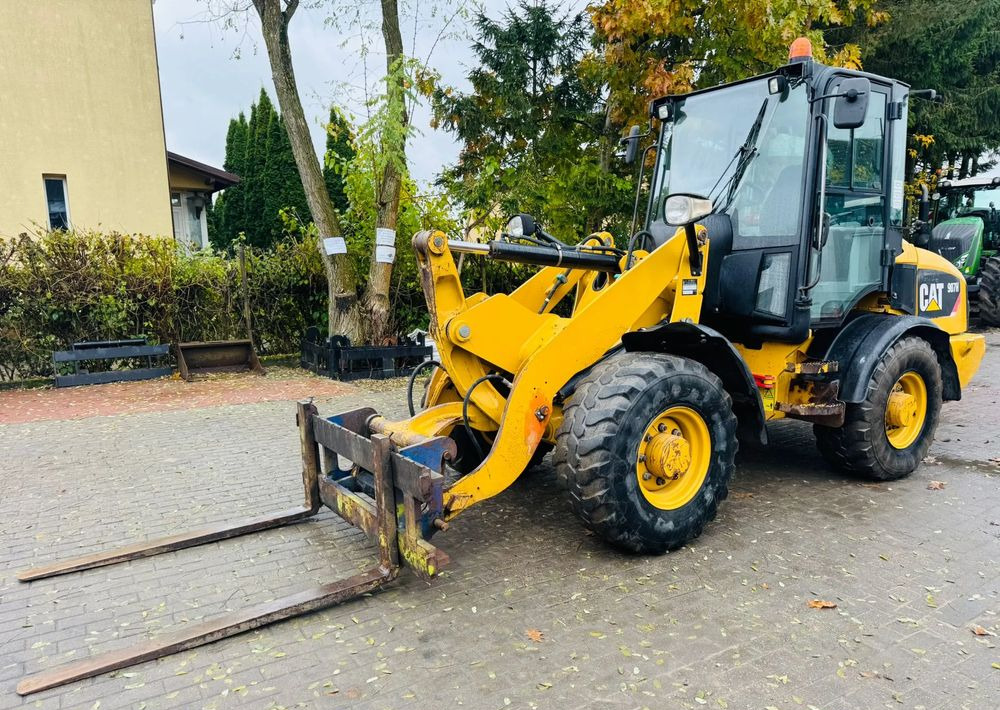 Caterpillar 907H - Máy xúc lật bánh lốp: hình 3 Caterpillar 907H - Máy xúc lật bánh lốp: hình 3