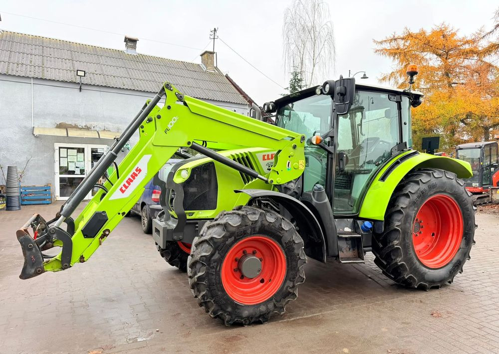 Claas Arion 420 - Máy cày: hình 1 Claas Arion 420 - Máy cày: hình 1
