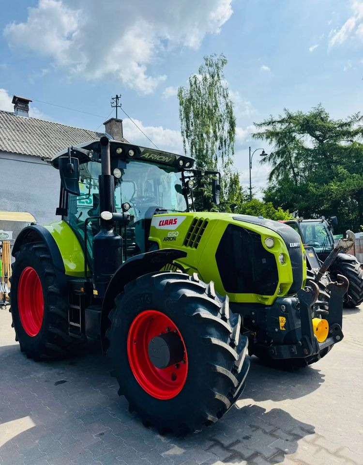 Claas Arion 650 CEBIS - Máy cày: hình 2 Claas Arion 650 CEBIS - Máy cày: hình 2