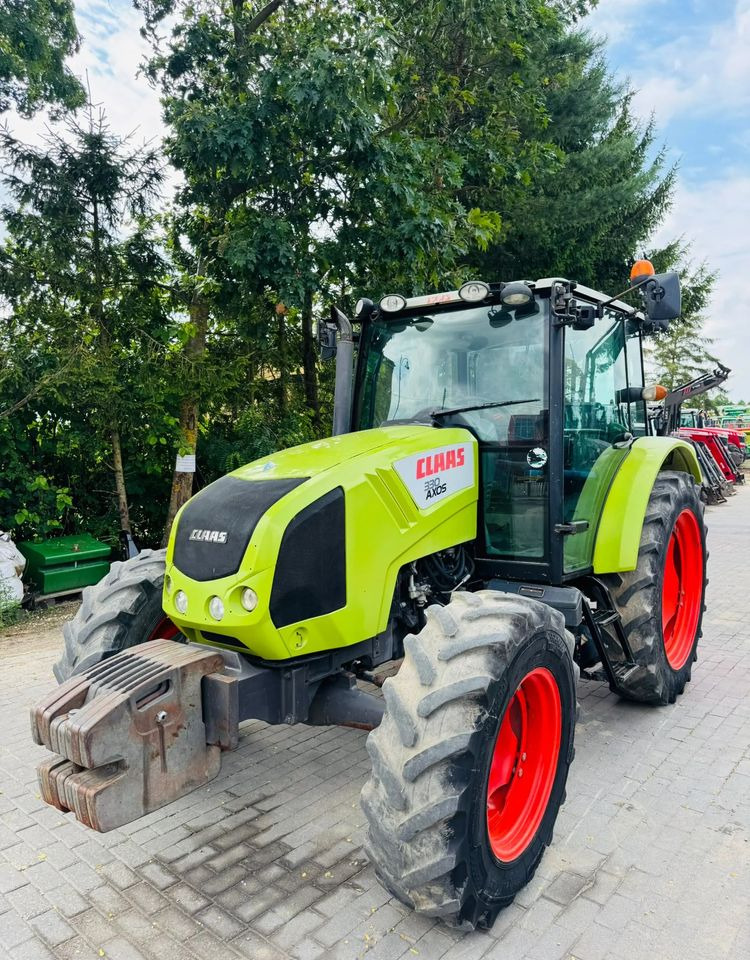 Claas Axos 330 - Máy cày: hình 1 Claas Axos 330 - Máy cày: hình 1