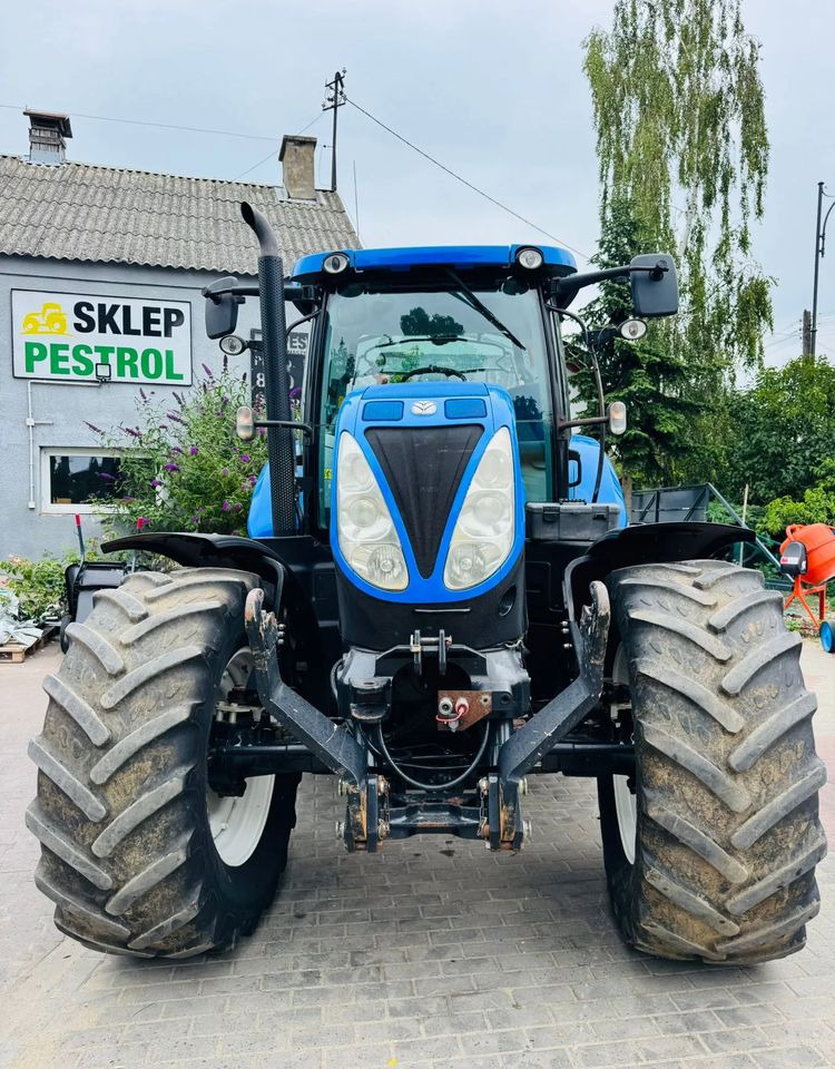 New Holland T7.210 - Máy cày: hình 1 New Holland T7.210 - Máy cày: hình 1