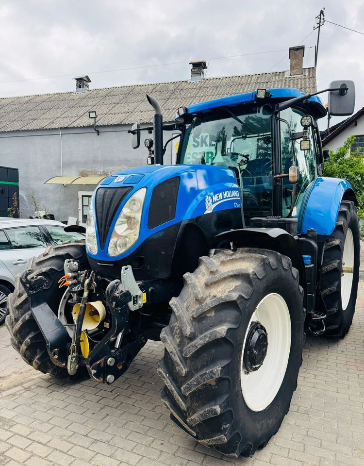 New Holland T7.210 - Máy cày: hình 1 New Holland T7.210 - Máy cày: hình 1
