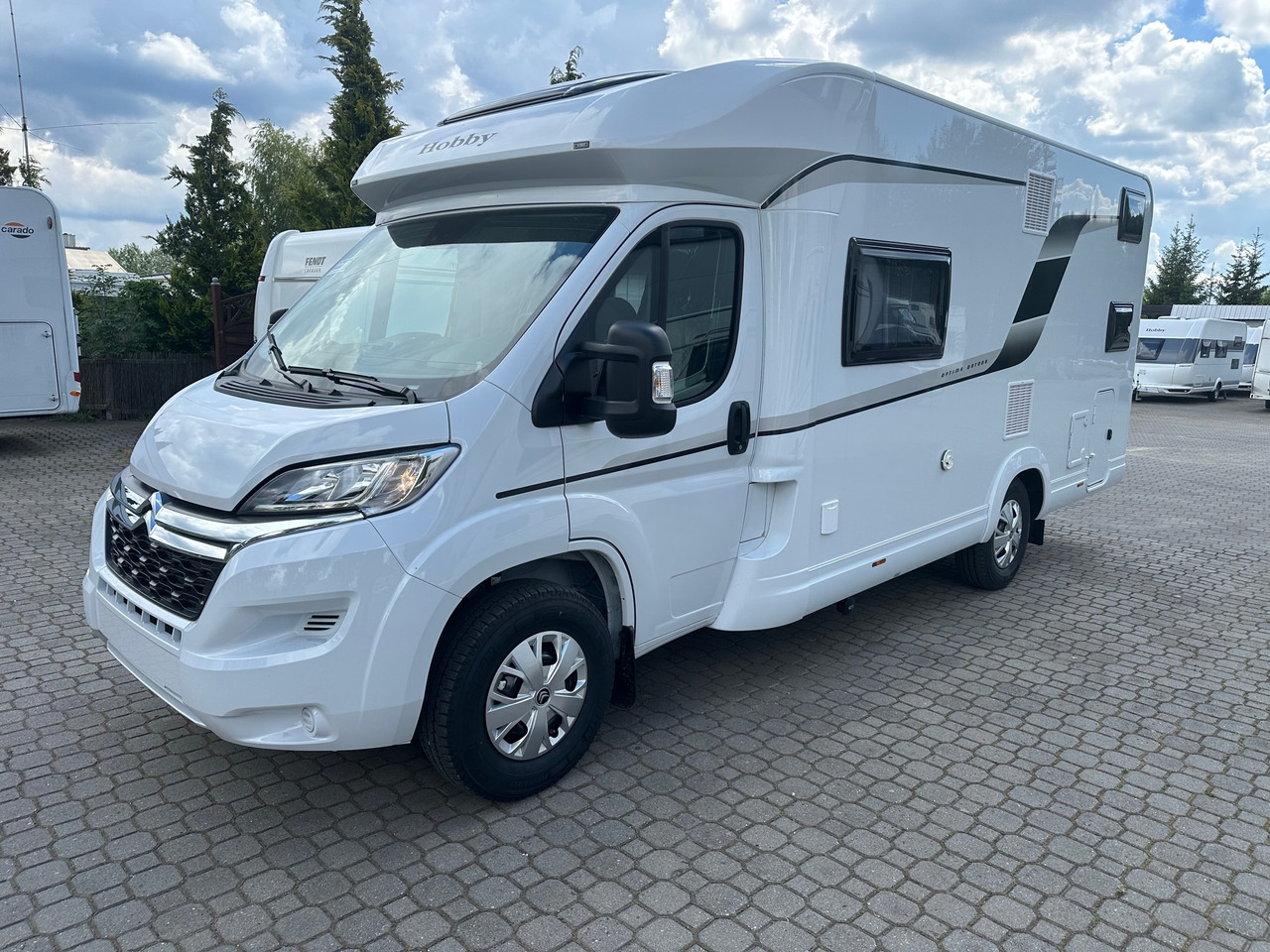 Hobby Optima T65 HKM Ontour 2024 - Xe cắm trại bán tích hợp: hình 1 Hobby Optima T65 HKM Ontour 2024 - Xe cắm trại bán tích hợp: hình 1
