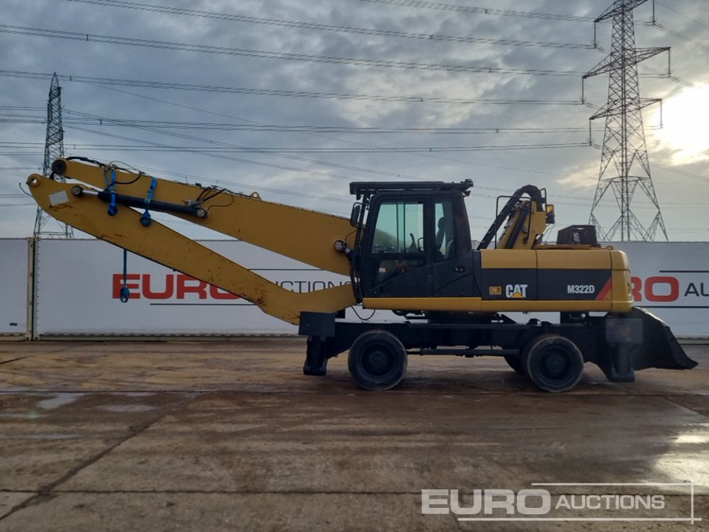 CAT M322D - Máy xúc bánh lốp: hình 2 CAT M322D - Máy xúc bánh lốp: hình 2