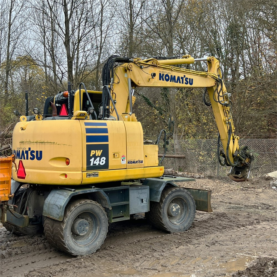 Komatsu PW148-10 - Máy xúc bánh lốp: hình 1 Komatsu PW148-10 - Máy xúc bánh lốp: hình 1