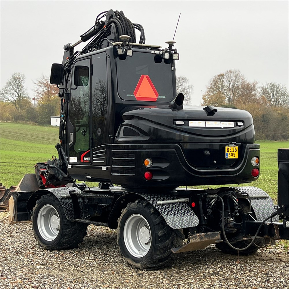 Takeuchi TB295 W - Máy xúc bánh lốp: hình 5 Takeuchi TB295 W - Máy xúc bánh lốp: hình 5