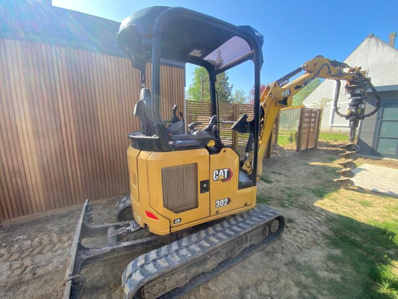 Caterpillar 302 CR - Máy xúc mini: hình 1 Caterpillar 302 CR - Máy xúc mini: hình 1