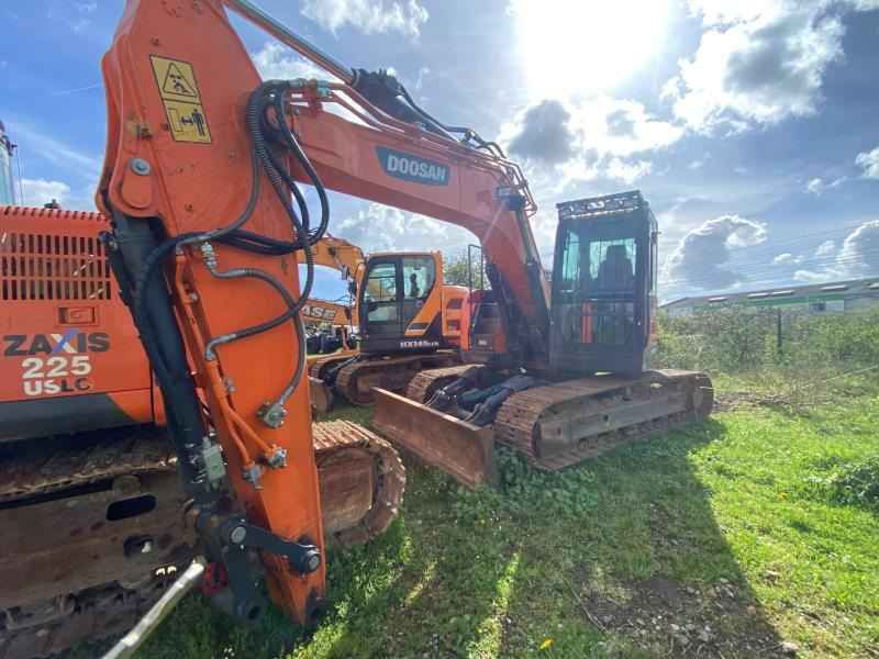 Doosan DX 140 LCR-5 - Máy xúc bánh xích: hình 1 Doosan DX 140 LCR-5 - Máy xúc bánh xích: hình 1