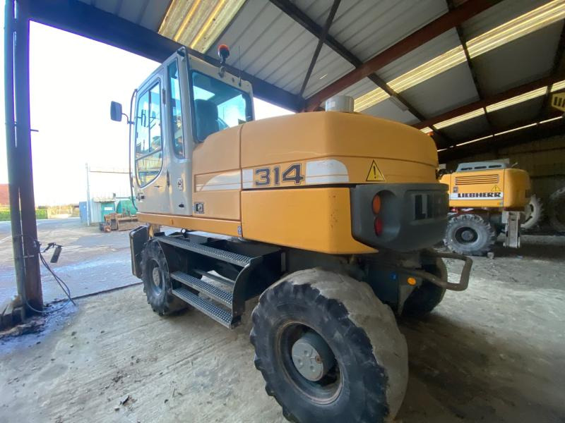 Liebherr A314 Litronic - Máy xúc bánh lốp: hình 5 Liebherr A314 Litronic - Máy xúc bánh lốp: hình 5