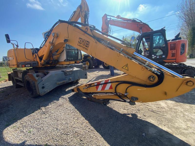Liebherr A316Litronic - Máy xúc bánh lốp: hình 3 Liebherr A316Litronic - Máy xúc bánh lốp: hình 3