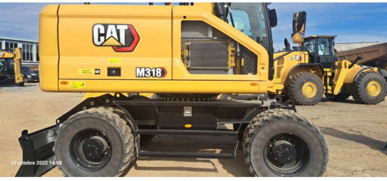Máy xúc bánh lốp CAT M318-07: hình 10 Máy xúc bánh lốp CAT M318-07: hình 10
