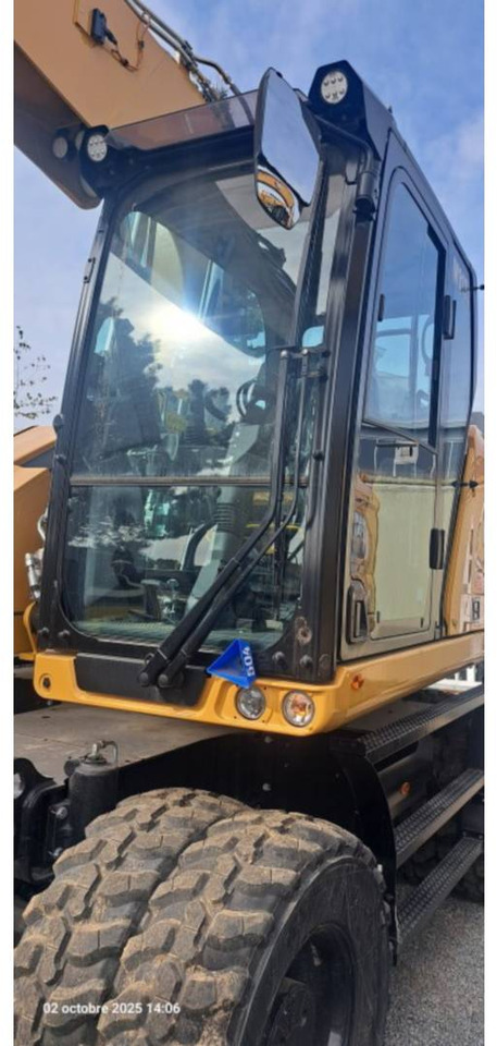 Máy xúc bánh lốp CAT M318-07: hình 24 Máy xúc bánh lốp CAT M318-07: hình 24