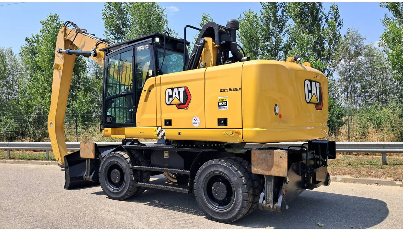 CAT MH3022-1 - Máy xúc bánh lốp: hình 4 CAT MH3022-1 - Máy xúc bánh lốp: hình 4