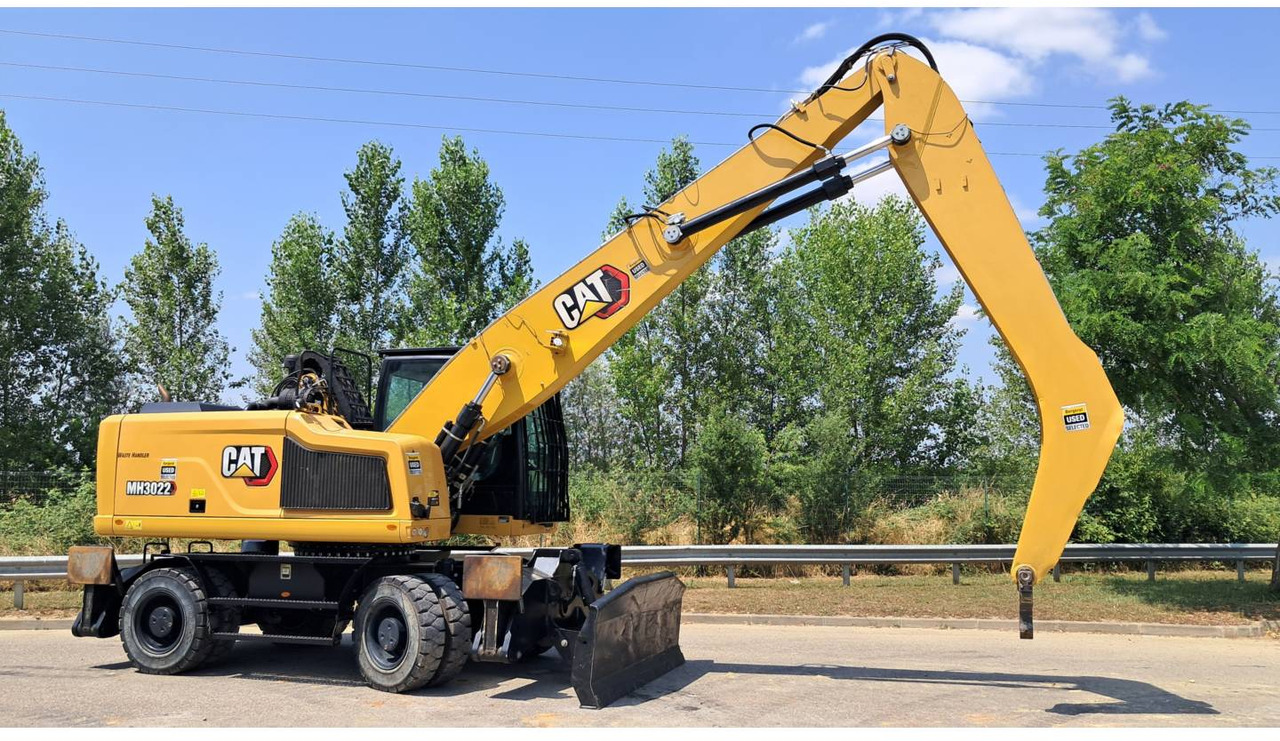 CAT MH3022-1 - Máy xúc bánh lốp: hình 2 CAT MH3022-1 - Máy xúc bánh lốp: hình 2