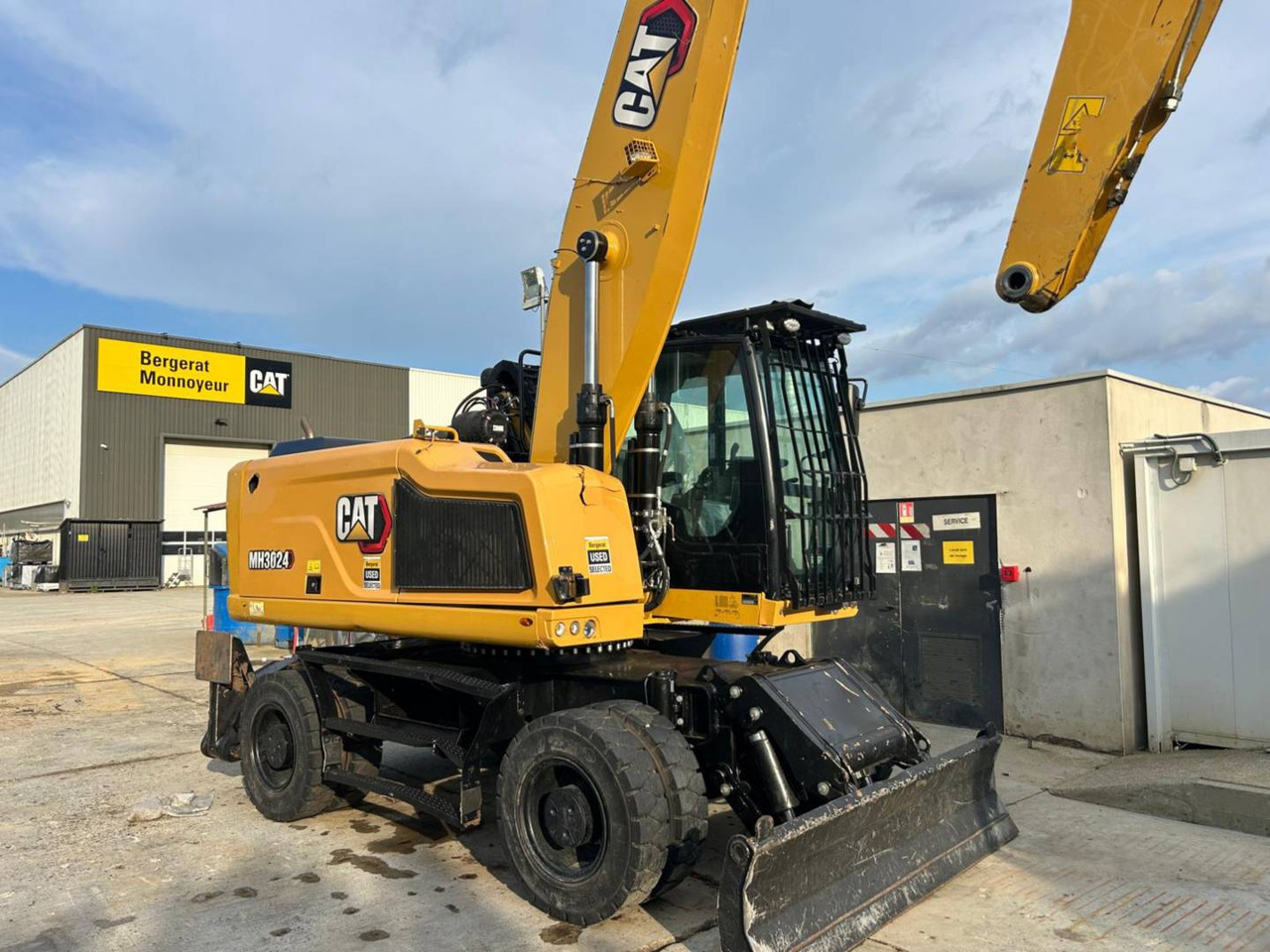 CAT MH3024-1 - Máy xúc bánh lốp: hình 2 CAT MH3024-1 - Máy xúc bánh lốp: hình 2