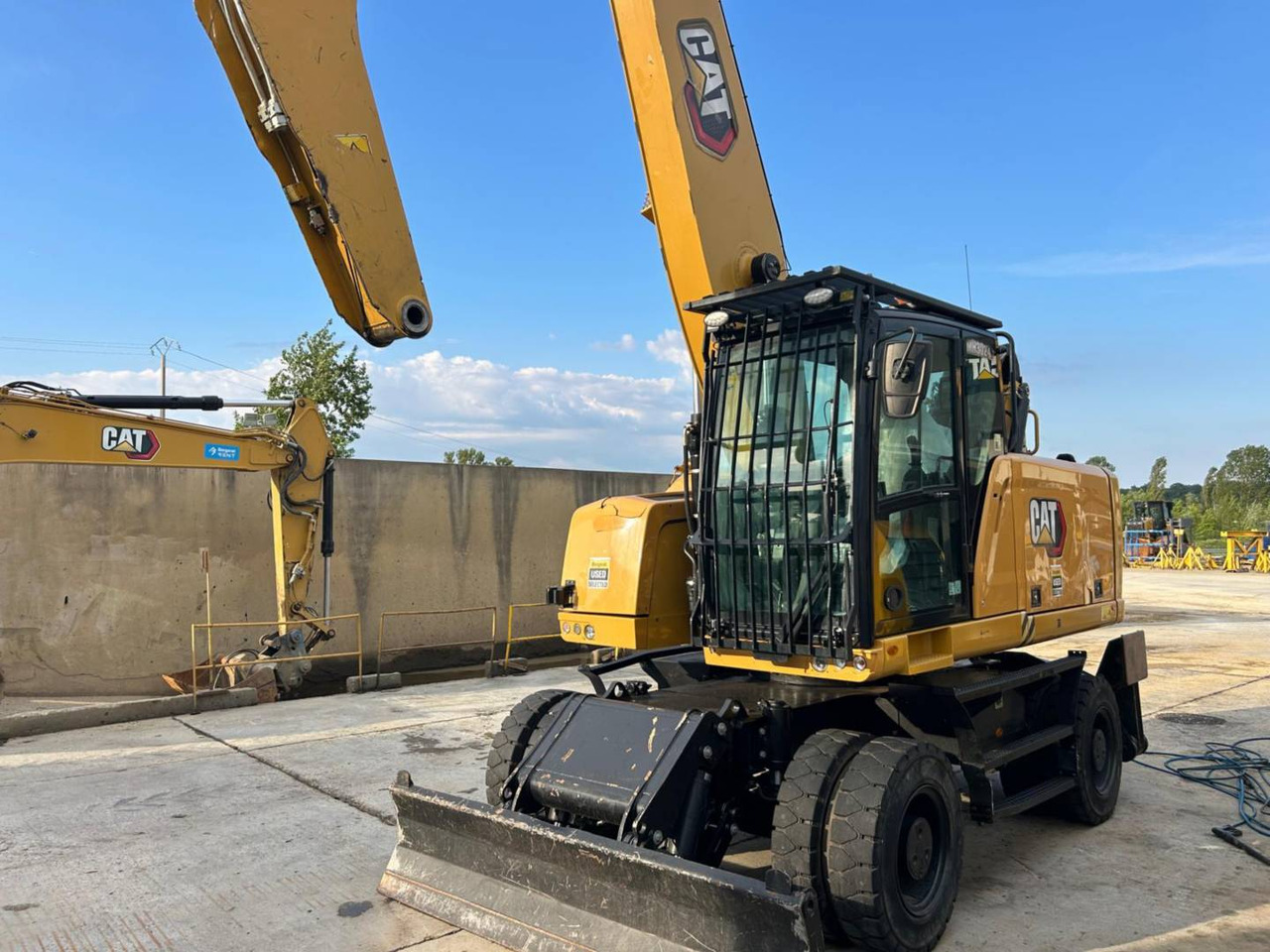 CAT MH3024-1 - Máy xúc bánh lốp: hình 1 CAT MH3024-1 - Máy xúc bánh lốp: hình 1