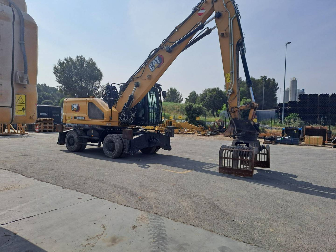 CAT MH3024 - Máy xúc bánh lốp: hình 4 CAT MH3024 - Máy xúc bánh lốp: hình 4