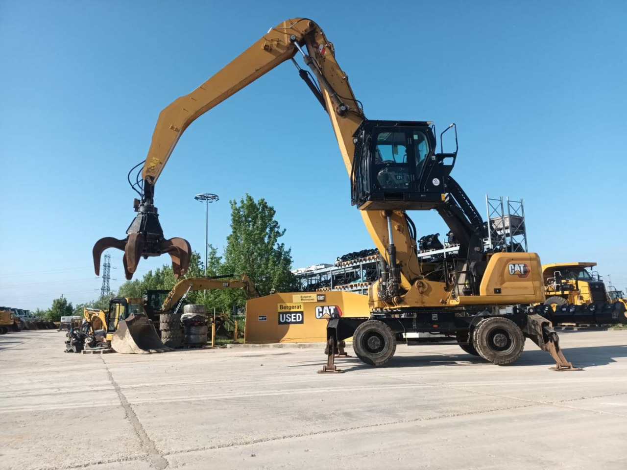 CAT MH3026 - Máy xúc bánh lốp: hình 1 CAT MH3026 - Máy xúc bánh lốp: hình 1