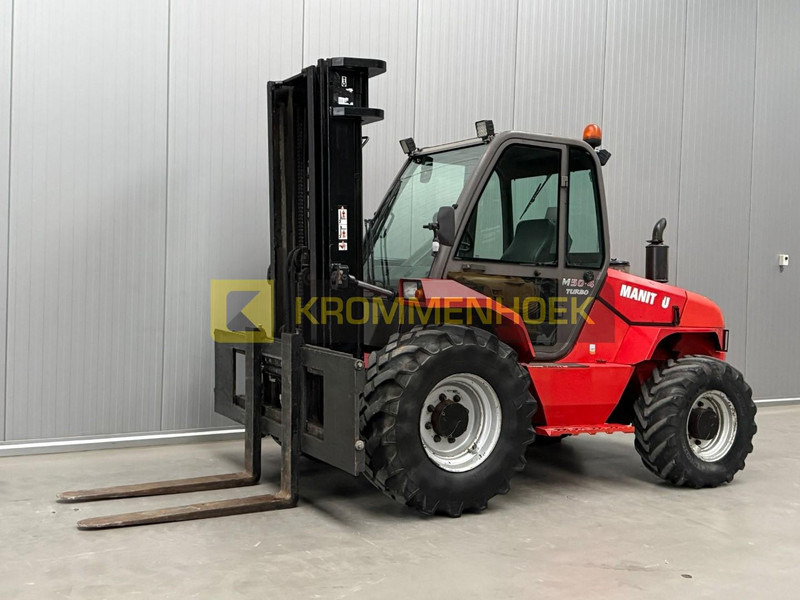 Manitou M 50-4 - Xe nâng địa hình gồ ghề: hình 2 Manitou M 50-4 - Xe nâng địa hình gồ ghề: hình 2
