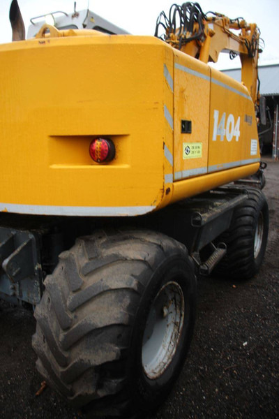 Atlas 1404 - Máy xúc bánh lốp: hình 5 Atlas 1404 - Máy xúc bánh lốp: hình 5