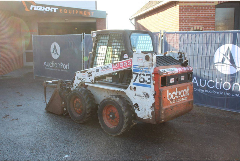 Bobcat 763 - Máy xúc lật bánh lốp: hình 3 Bobcat 763 - Máy xúc lật bánh lốp: hình 3