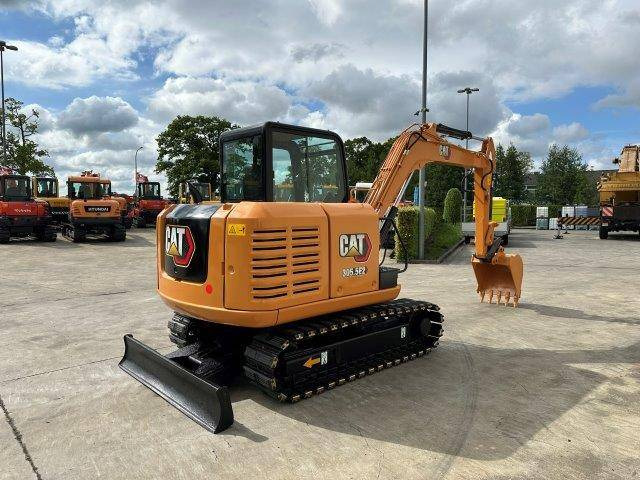 Caterpillar 305.5E2 - Máy xúc bánh xích: hình 4 Caterpillar 305.5E2 - Máy xúc bánh xích: hình 4