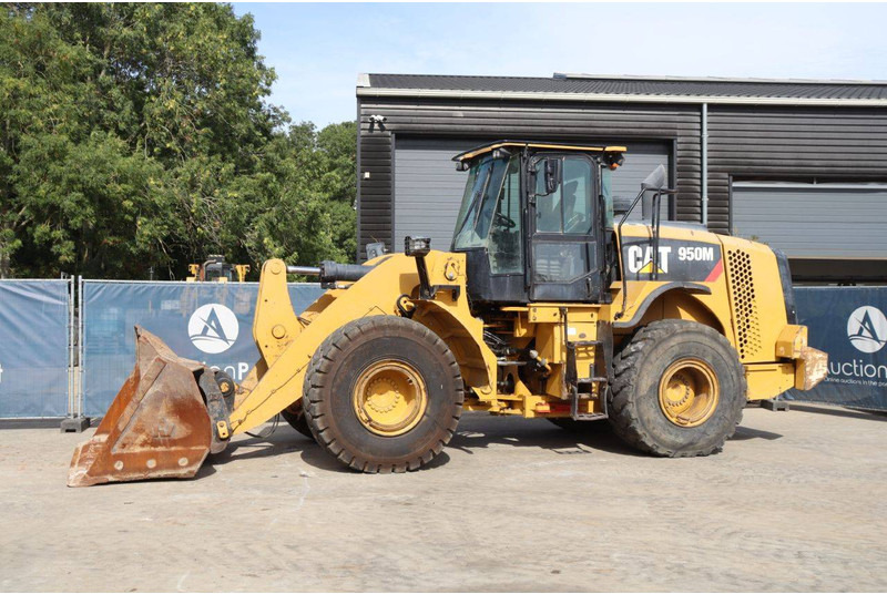 Caterpillar 950M - Máy xúc lật bánh lốp: hình 1 Caterpillar 950M - Máy xúc lật bánh lốp: hình 1