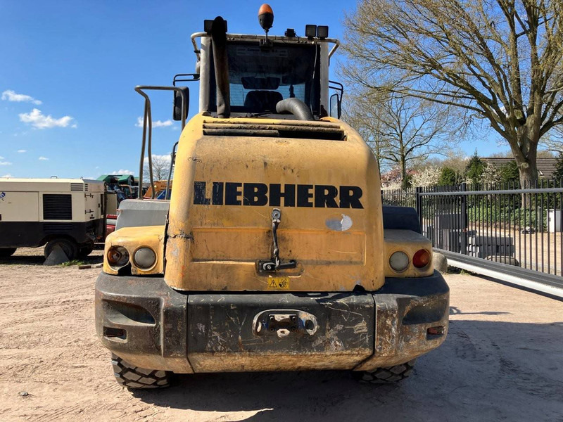 Liebherr L524 - Máy xúc lật bánh lốp: hình 4 Liebherr L524 - Máy xúc lật bánh lốp: hình 4
