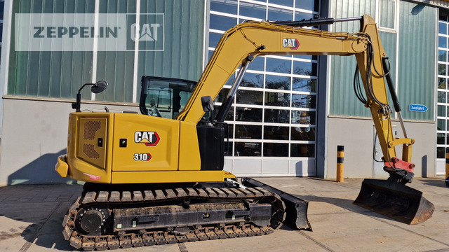 Cat 310 - Máy xúc mini: hình 4 Cat 310 - Máy xúc mini: hình 4