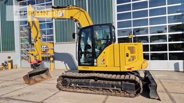 Cat 310 - Máy xúc mini: hình 2 Cat 310 - Máy xúc mini: hình 2