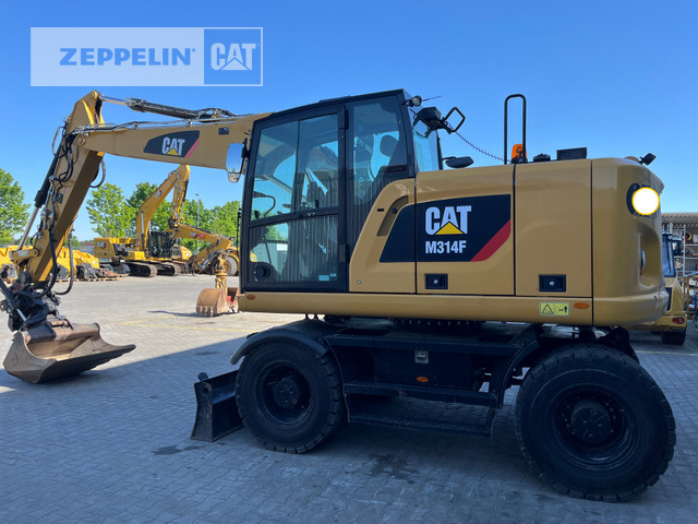 Cat M314F - Máy xúc bánh lốp: hình 1 Cat M314F - Máy xúc bánh lốp: hình 1