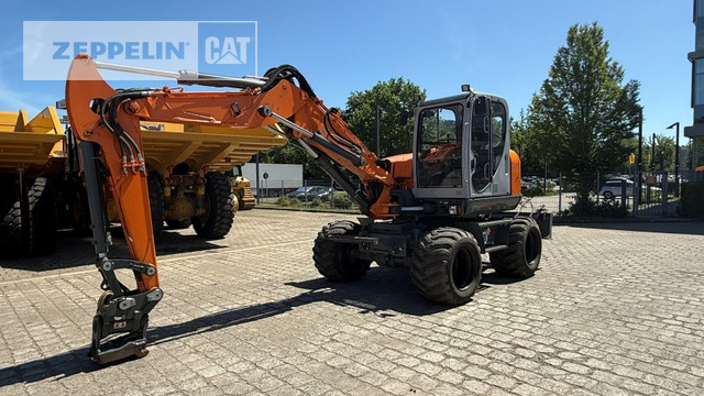Wacker EW100 - Máy xúc bánh lốp: hình 2 Wacker EW100 - Máy xúc bánh lốp: hình 2