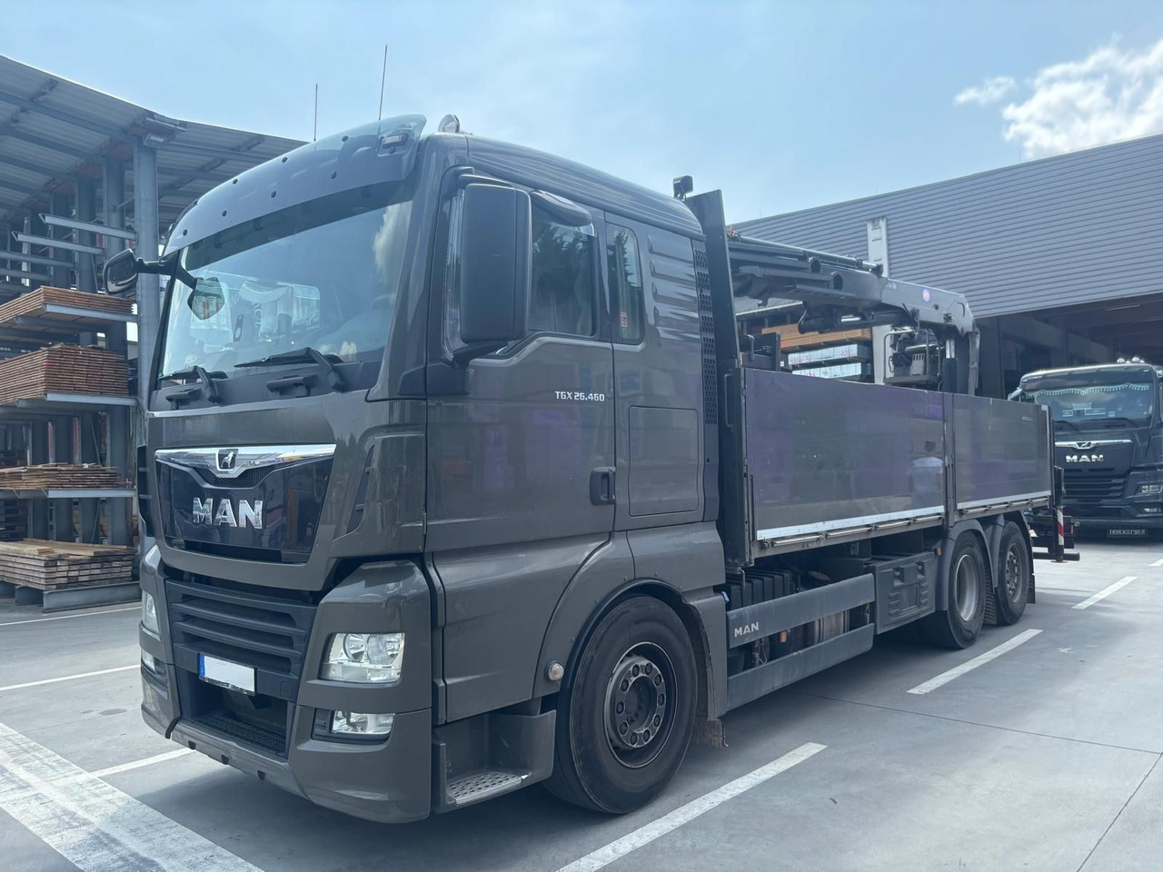 MAN 26.460 TGX Baustoffkran HMF 2110-L3 - Xe cẩu tự hành: hình 1 MAN 26.460 TGX Baustoffkran HMF 2110-L3 - Xe cẩu tự hành: hình 1