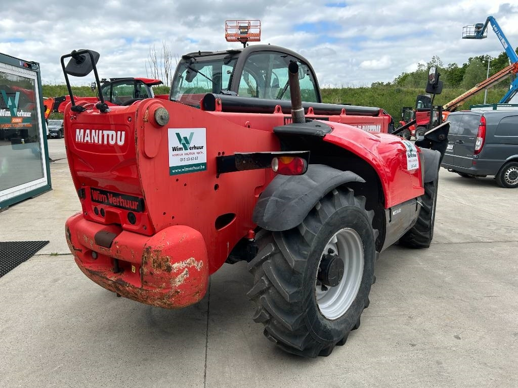 Manitou MT 1440 - Xe nhấc hình viễn vọng kính: hình 5 Manitou MT 1440 - Xe nhấc hình viễn vọng kính: hình 5