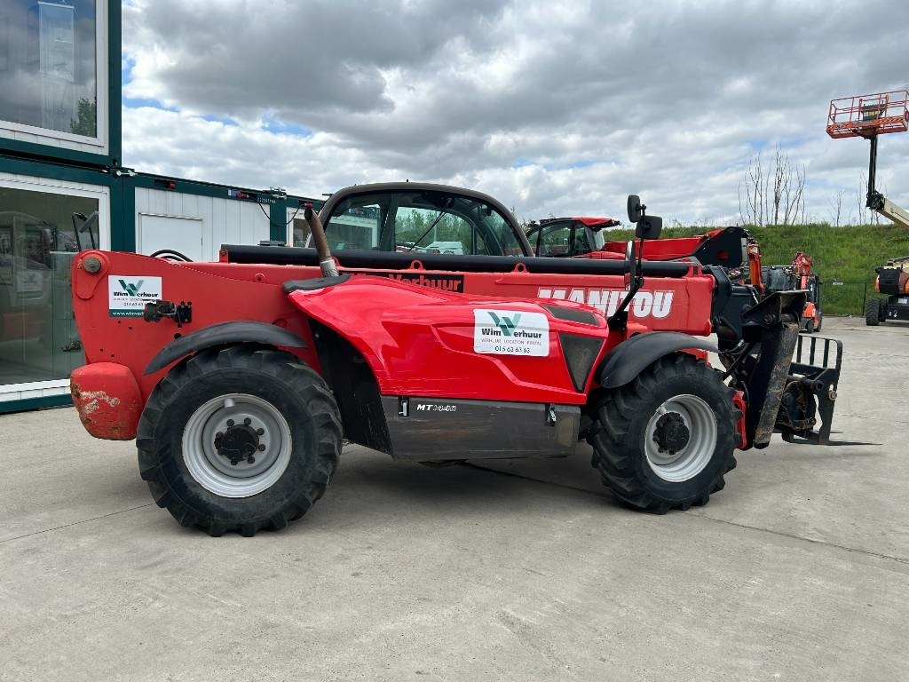 Manitou MT 1440 - Xe nhấc hình viễn vọng kính: hình 4 Manitou MT 1440 - Xe nhấc hình viễn vọng kính: hình 4