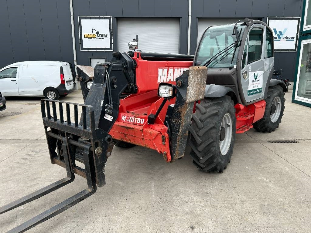 Manitou MT 1440 - Xe nhấc hình viễn vọng kính: hình 1 Manitou MT 1440 - Xe nhấc hình viễn vọng kính: hình 1
